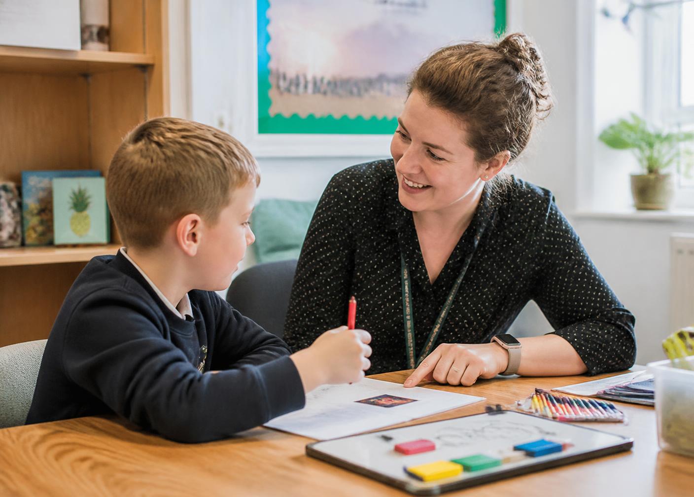 Learning Support Assistant helping a child